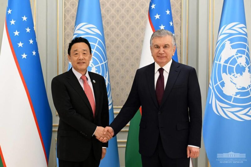 Having a meeting with Uzbek President Shavkat Mirziyoyev